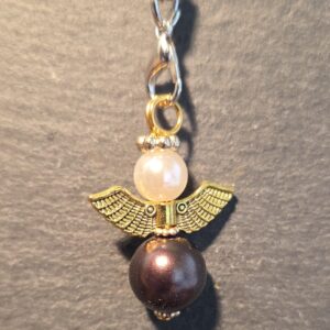 Beschermengel Bruin, Goud